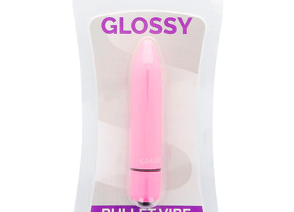 Glänzender dünner bullet-vibrator in tiefrosefarben mit glänzender oberfläche in klarer plastikverpackung