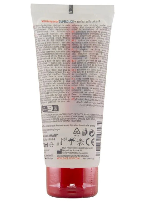 Ein rotes transparentes rohr mit erwärmendem anal superglide wasserbasiertem gleitmittel 100 ml