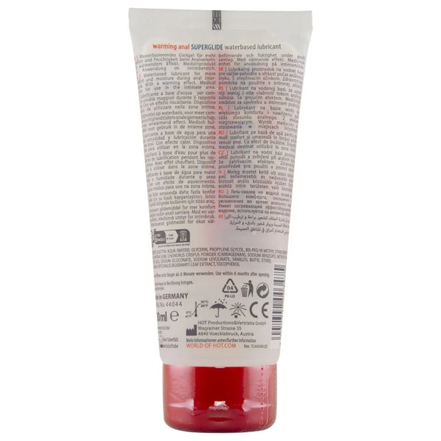 Ein rotes transparentes rohr mit erwärmendem anal superglide wasserbasiertem gleitmittel 100 ml