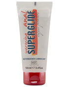 Weißes tube mit rotem deckel und orange-rotem streifen, superglide wärmendes anal-lubrikant von lique plaisir 100 ml