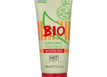 Ein blassgrünes und orangenes rohr des bio wasserbasierten wärmenden schmiermittels hot mit rotem deckel 100 ml