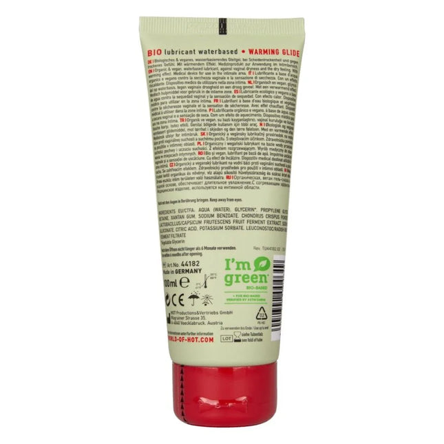 Ein roter und weißer tube i’m green bio-schmiermittel auf wasserbasis mit wärmewirkung und warming glide formel 100 ml