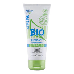Weißer und hellgrüner bio superglide wasserbasierter gleitmittel-tube von hot mit umweltfreundlicher markierung und klappverschluss