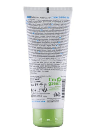 Weiße tube hot bio-schmiermittel auf wasserbasis xtreme 100 ml mit grünem xtreme superglide bio-lubricant