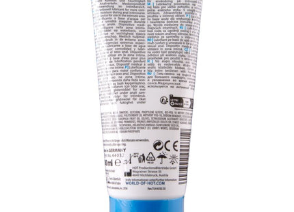 Weiße tube exxtreme glide wasserbasiertes gleitmittel mit silbernem deckel und mehrsprachiger beschriftung