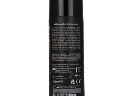 Schwarze zylindrische spraydose extreme glide silikonbasiertes gleitmittel mit mehrsprachigem text und barcode rückseite