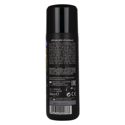 Schwarze zylindrische spraydose extreme glide silikonbasiertes gleitmittel mit mehrsprachigem text und barcode rückseite