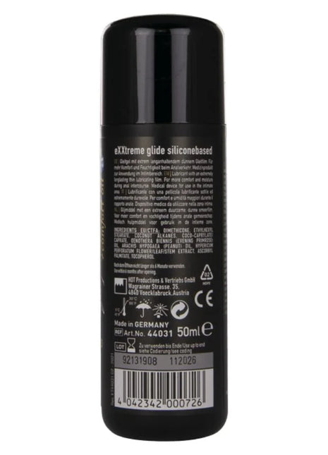 Schwarze zylindrische flasche mit weißer beschriftung und barcode der silikonbasierte gleitgel hot extra gleitend 50 ml rückseite