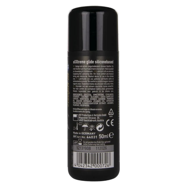 Schwarze zylindrische flasche mit weißer beschriftung und barcode der silikonbasierte gleitgel hot extra gleitend 50 ml rückseite