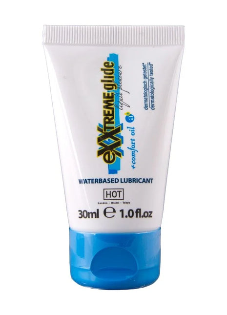 Ein weiß-blauer 30ml tube hot extratreme gleitmittel auf wasserbasis mit komfortöl a+ inhaltsstoffe sichtbar