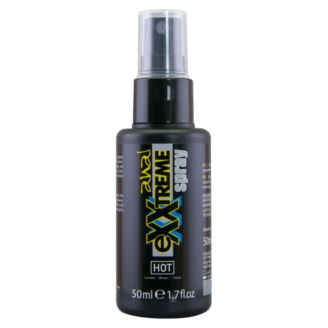 Schwarze kunststoff-sprühflasche mit klarem sprühkopf und etikett revel xxtreme hot spray für analgebrauch 50 ml