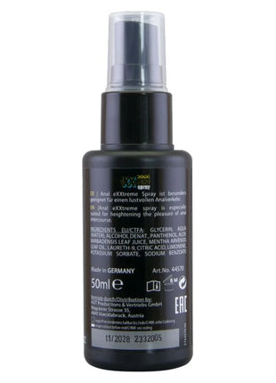 Schwarze kunststoff-sprühflasche hot ekstratremes analspray 50 ml mit klarer düse und rückseitigem etikett mit inhaltsstoffen