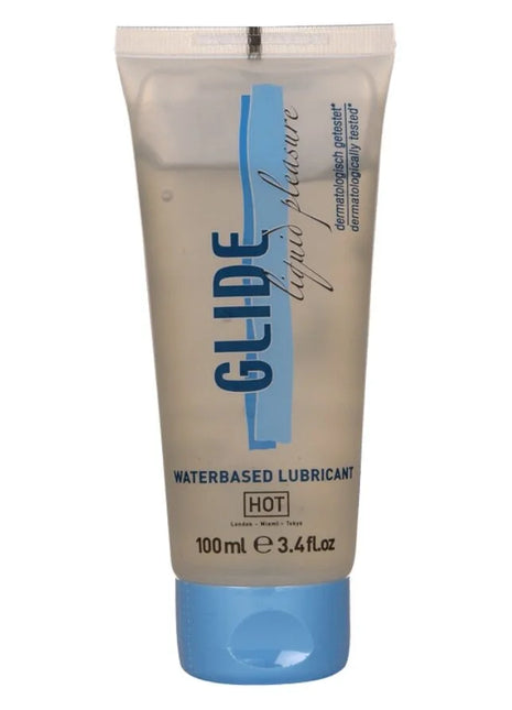 Ein transparenter beiger schlauch mit heißem glide wasserbasiertem gleitmittel 100 ml und blauen akzenten