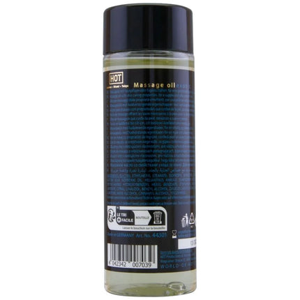 Klar glasflasche mit schwarzem verschluss und dunkelblauem etikett mit hellem gelbem massageöl hot massageöl exotisch spezial 100 ml