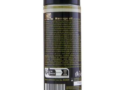 Klar glasflasche mit schwarzem deckel und bernsteinfarbenem massageöl hot massageöl jasmin 100 ml label