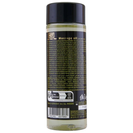 Klar glasflasche mit schwarzem deckel und bernsteinfarbenem massageöl hot massageöl jasmin 100 ml label