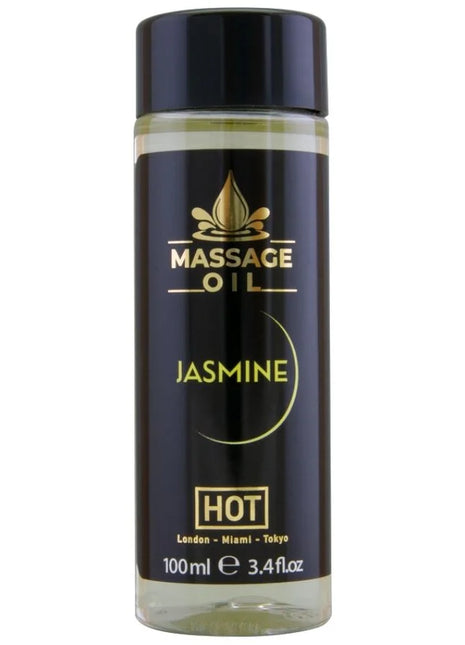 Schwarze glasflasche mit goldener schrift und schwarzem deckel mit massageöl jasmin hot 100 ml fassungsvermögen