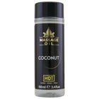Hot massageöl kokosnuss 100 ml in klarer glasflasche mit schwarzem und goldenem etikett für entspannende massages