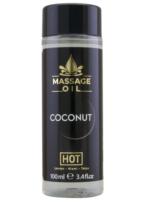 Hot massageöl kokosnuss 100 ml in klarer glasflasche mit schwarzem und goldenem etikett für entspannende massages