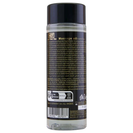 Klarer kunststoffflasche mit schwarzem deckel und etikett enthält heißes massageöl vanille 100 ml