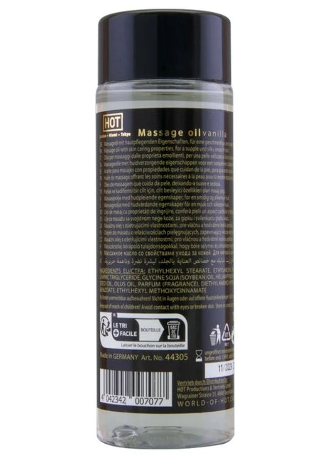 Klarer kunststoffflasche mit schwarzem deckel und etikett enthält heißes massageöl vanille 100 ml
