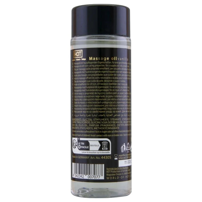 Klarer kunststoffflasche mit schwarzem deckel und etikett enthält heißes massageöl vanille 100 ml