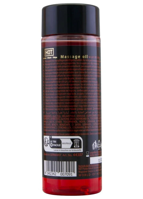 Eine klare kunststoffflasche mit schwarzem deckel, gefüllt mit rotem warmem massageöl hot von london miami tokyo 100 ml