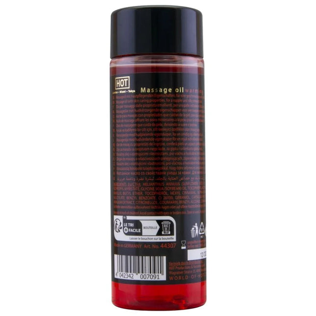 Eine klare kunststoffflasche mit schwarzem deckel, gefüllt mit rotem warmem massageöl hot von london miami tokyo 100 ml