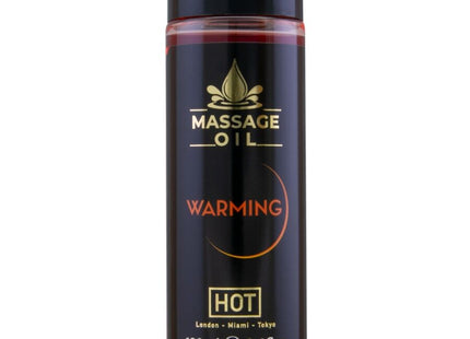 Schwarze zylindrische flasche hot massageöl wärmend 100 ml mit glänzendem schwarzen deckel und rotem boden