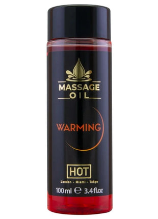 Schwarze zylindrische flasche hot massageöl wärmend 100 ml mit glänzendem schwarzen deckel und rotem boden