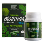 Weiße plastikflasche mit grün weißem etikett hot premium moringa plus maca für aktive männer neben dunkelgrüner tribulus terrestris box