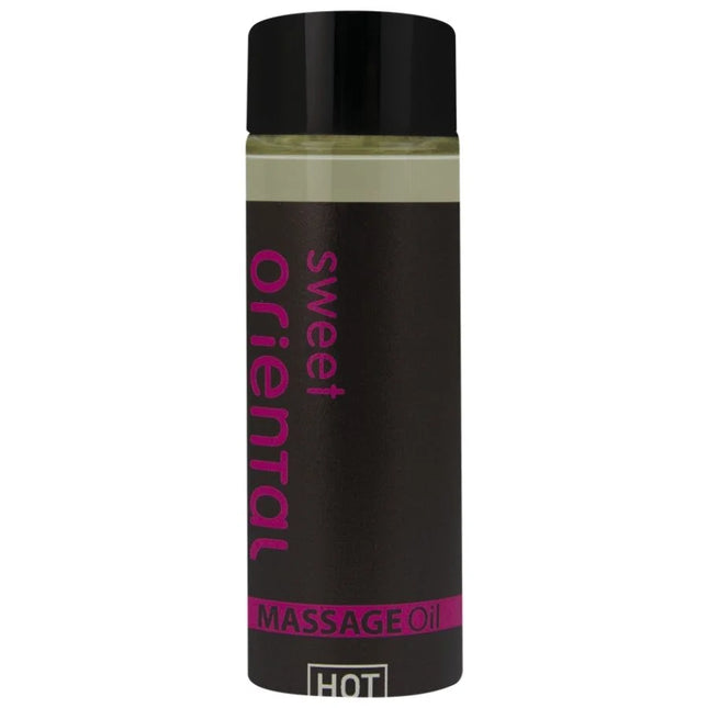Ein schwarzes, glänzendes fläschchen mit pinkem sweet oriental massageöl text für orientalisches Massageöl süß 100 ml