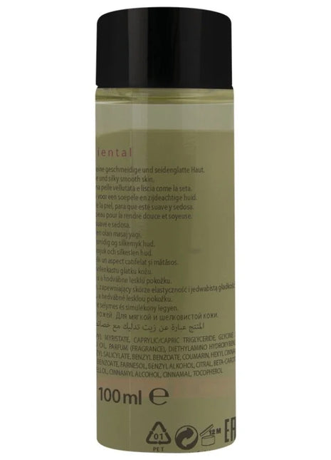 Eine klare glasflasche mit schwarzem deckel enthält olivgrünes hot orientalisches massageöl süß 100 ml