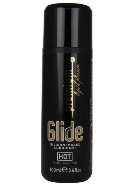 Schwarze zylindrische flasche mit glide hot premium silikonbasiertem gleitmittel 100 ml sichtbar von vorne