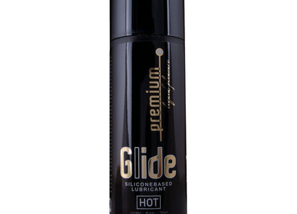 Schwarze zylinderförmige flasche von glide premium silikonbasierem gleitmittel in der hot variante 200 ml