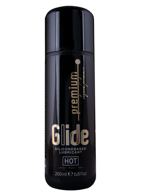 Schwarze zylinderförmige flasche von glide premium silikonbasierem gleitmittel in der hot variante 200 ml