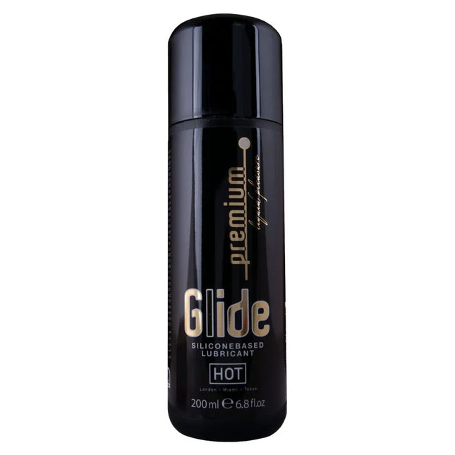 Schwarze zylinderförmige flasche von glide premium silikonbasierem gleitmittel in der hot variante 200 ml
