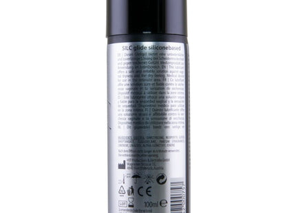 Schwarze zylindrische spraydose silc glide silikonbasiertes schmiermittel 100 ml mit silbernem etikett und schwarzem deckel