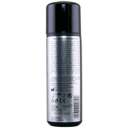 Schwarze zylindrische spraydose silc glide silikonbasiertes schmiermittel 100 ml mit silbernem etikett und schwarzem deckel