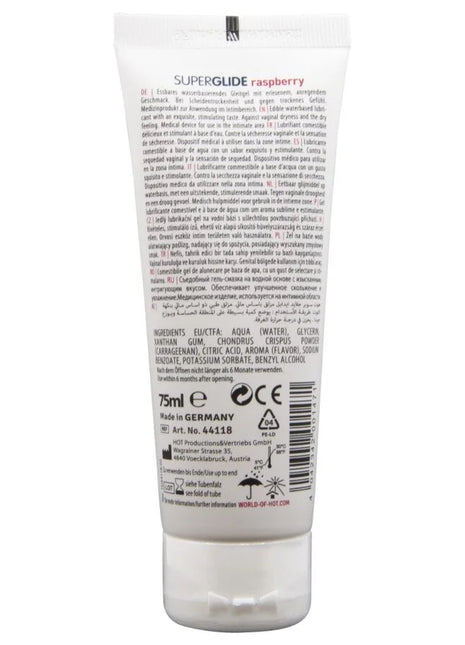 Weißes tube superglide essbarer gleitmittel auf wasserbasis himbeere 75 ml sichtbar auf weißem hintergrund