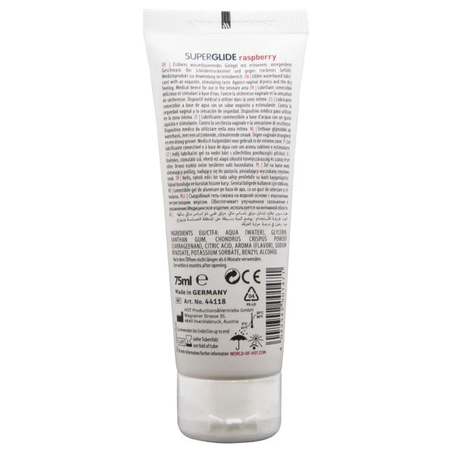 Weißes tube superglide essbarer gleitmittel auf wasserbasis himbeere 75 ml sichtbar auf weißem hintergrund
