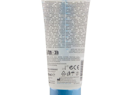 Ein durchscheinendes blaues plastikrohr mit hot superglide wasserbasiertem gleitmittel 100 ml mit weißem etikett und schwarzer schrift