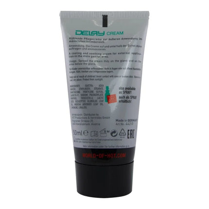 Tube aus silber und schwarz mit matter oberfläche und grünem text für hot verzögernde creme 50 ml