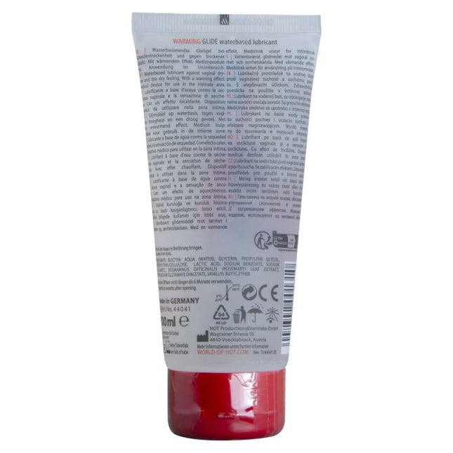 Ein roter transparenter kunststofftube mit weißem etikett und schwarzem text für warmendes wasserbasiertes gleitmittel hot 100 ml