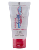 Transparenter kunststofftube mit rotem verschluss und blauem pinkem weißem branding für warming glide wasserbasiertes gleitmittel hot 30 ml