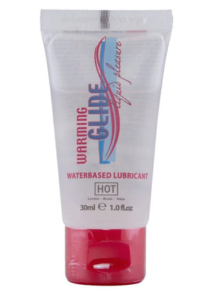 Transparenter kunststofftube mit rotem verschluss und blauem pinkem weißem branding für warming glide wasserbasiertes gleitmittel hot 30 ml