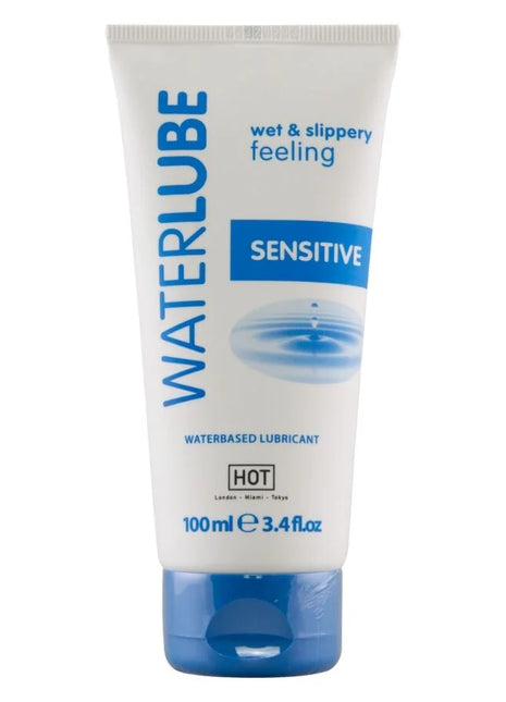 Weiße tube hot wasser gleitfilter auf wasserbasis 100 ml mit blauem branding und passendem blauem verschluss