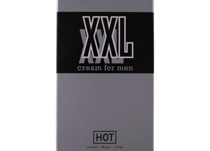 Ein schlanker rechteckiger karton mit xxl creme für männer in mattsilber und schwarz mit weißen buchstaben