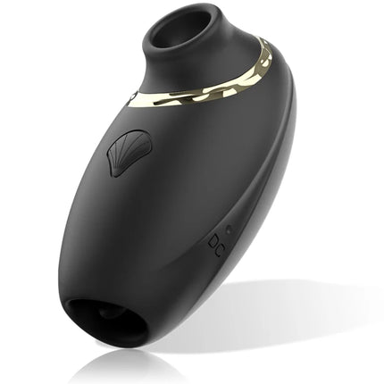 Schwarzer silikon-saugnapf mit goldfarbener metallakzentband und muschelförmigem knopf aus ibiza 3in1 vibe