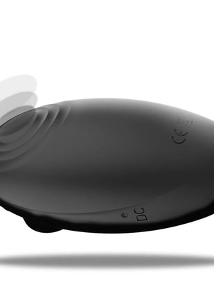 Schwarzes, ovales 3-in-1 vibrierendes ibiza gerät mit matter oberfläche und geriffelter struktur für saugen lecken und pulsiere